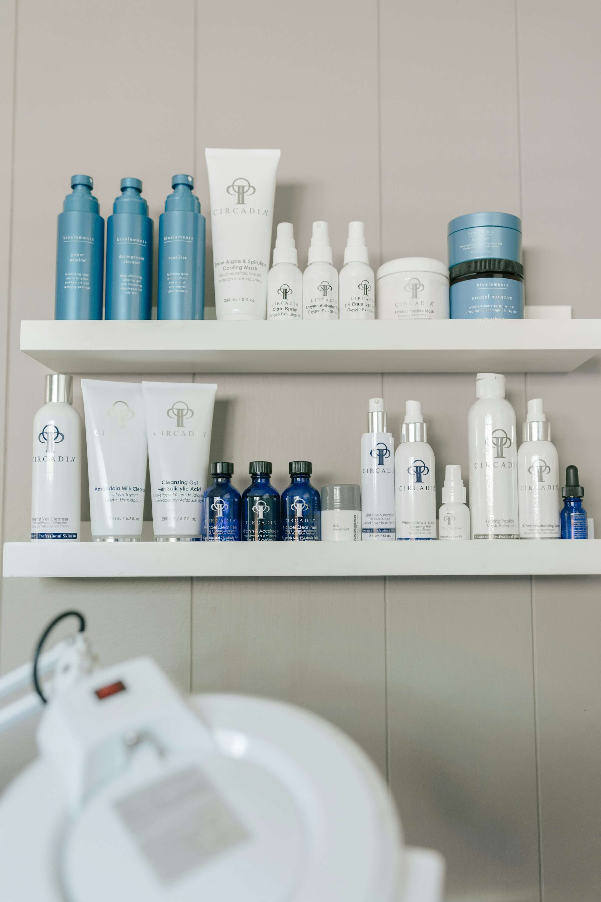 Shelves of professional skincare products used at Skin by Lyze